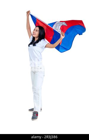 Les femmes asiatiques célèbrent la journée de l'indépendance du Cambodge le 09 novembre en tenant le drapeau du Cambodge isolé sur fond blanc Banque D'Images