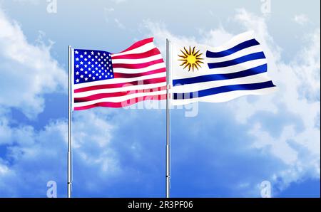 Les drapeaux de l'Amérique et de l'Uruguay agitant contre le ciel bleu Banque D'Images