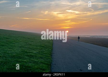 Coucher de soleil sur les rives de la Mer du Nord Frise orientale Banque D'Images