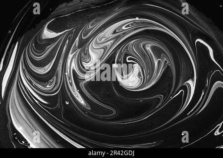 Vagues et tourbillons abstraits blancs sur le noir. Art fluide arrière-plan ou texture en marbre abstrait Banque D'Images