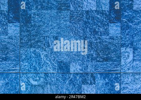 Décoration bleue damiers mur texture abstraite mosaïque rock modèle arrière-plan. Banque D'Images