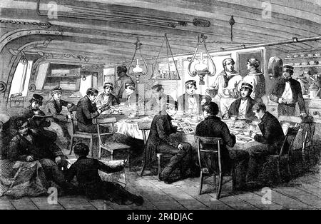 Gun-Room - Midshipmenss' Mess, Breakfast, H.M.S. "César" - flotte Baltique, 1856. Des officiers et des hommes de la Marine royale à bord d'un navire de guerre pendant la guerre de Crimée. Notez les tiges de rampe pour les canons stockés en hauteur. De "Illustrated London News", 1856. Banque D'Images