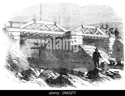 Le chemin de fer de Valparaiso et de Santiago - Pont à Valparaiso, 1856. « Cette partie d'une ligne très difficile et très coûteuse couvre trois miles et demi le long de la côte, et présente une série de murs de mer, brise-lames, et divers autres défenses de rivage d'une force et d'une solidité énormes, la nature de la mer ici parfois exigeant des précautions extrêmes. La roche syénite dans ce quartier est du caractère le plus obdurate, et un travail immense a été nécessaire pour surmonter les obstacles la nature sauvage de la rive présentée, et à un point un tunnel a été rendu nécessaire, sur une courbe vive. Banque D'Images