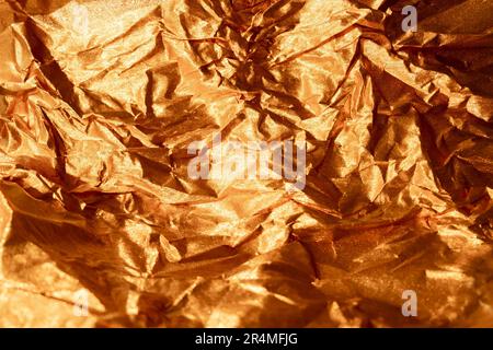 Texture de feuille froissée fond métallique doré Banque D'Images