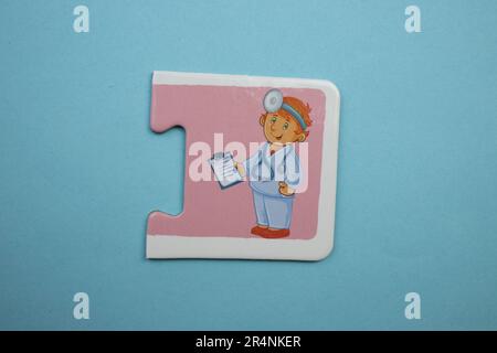 Casse-têtes d'information placés sur un fond bleu. Médecin, santé Banque D'Images