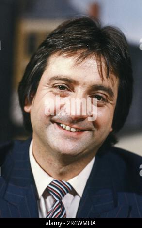 Portrait de l'animateur de télévision français Jean-Pierre Descombes, vers 1985. Banque D'Images