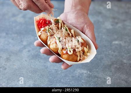 Takoyaki (balles de calmar, Japon) Banque D'Images