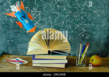 danger de l'intelligence artificielle pour l'éducation, la connaissance et le concept d'apprentissage avec les livres et le tableau noir de l'école Banque D'Images