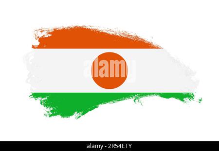 Drapeau national du Niger peint avec pinceau sur blanc isolé Banque D'Images