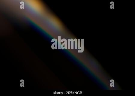 Fuite de lumière analogique produite avec des cristaux de verre et des lumières LED, le fond est noir pur. Idéal pour les revêtements. Banque D'Images