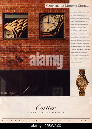 Publicité de montre d'or Cartier Banque D'Images