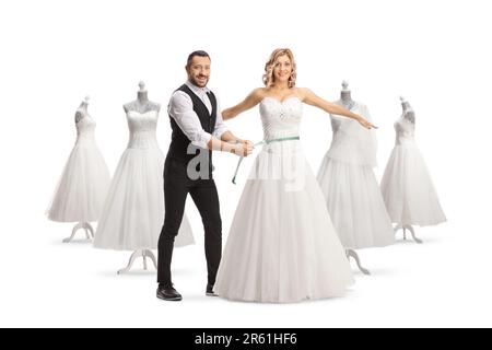 Robe de mariée tailleur prendre des mesures pour une robe isolée sur fond blanc Banque D'Images