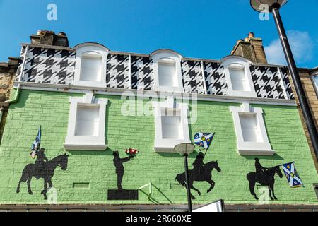 Travaux d’art sur la construction à Galashiels, aux frontières écossaises il représente le rassemblement emblématique de Braw Lads Banque D'Images