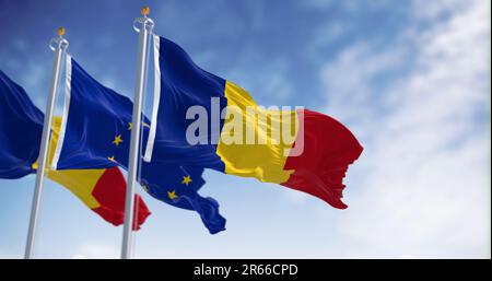 Les drapeaux de la Roumanie et de l'Union européenne agitant dans le vent par temps clair. Membre de l'UE depuis janvier 2007. 3d rendu d'illustration. Tissu de fluttering Banque D'Images