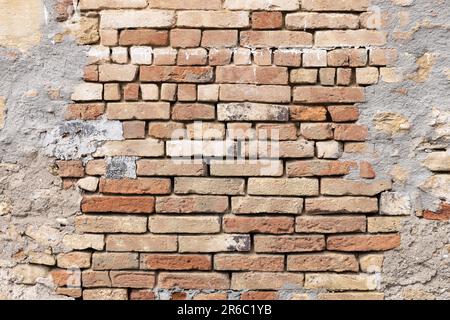 Arrière-plan de mur de briques vintage abstrait vide encadré par une bordure de ciment Banque D'Images