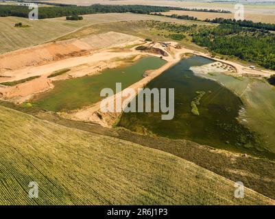 Paysage de sable et processus d'exploitation minière et de production de produits Banque D'Images