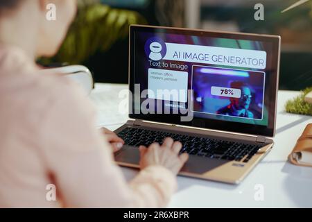 Vue de derrière une femme moderne avec ordinateur portable utilisant le texte à l'image ai générateur d'image dans le bureau moderne. Banque D'Images