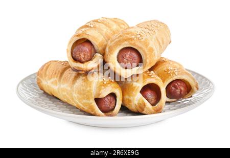 Assiette avec délicieux petits pains à saucisse isolés sur du blanc Banque D'Images