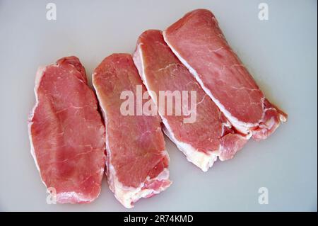 Top shot de viande de porc crue Banque D'Images
