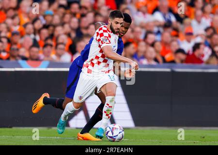 14-06-2023: Sport: Nederland contre Kroatie ROTTERDAM, PAYS-BAS - JUIN 14: Nediljko Labrovic (Croatie) et Denzel Dumfries (pays-Bas) pendant le tapis Banque D'Images