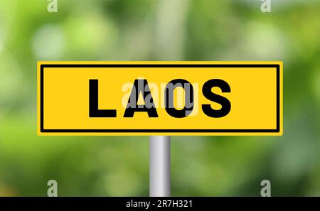 Panneau de route Laos sur fond flou Banque D'Images