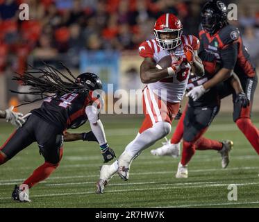 (Ottawa, Canada---15 juin 2023) Dedrick Mills (26) des Stampeders de Calgary dans la Ligue canadienne de football (LCF), action de saison régulière entre les Stampeders de Calgary aux RedNoirs d'Ottawa. Photographie Copyright Sean Burges / Mundo Sport Images 2023. Banque D'Images