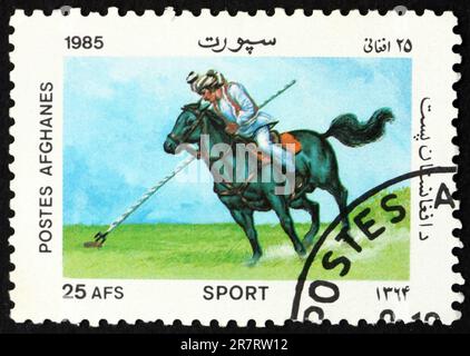 AFGHANISTAN - VERS 1985 : un timbre imprimé en Afghanistan montre l'adhérence des cochons, sport, vers 1985 Banque D'Images