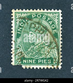 Annulé timbre de poste imprimé par l'Inde, qui montre le portrait du roi George, vers 1937. Banque D'Images