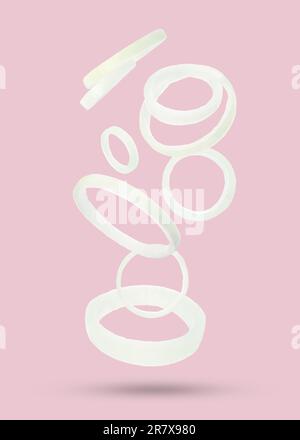 Beaucoup de rondelles d'oignon tombant sur fond rose pastel Banque D'Images