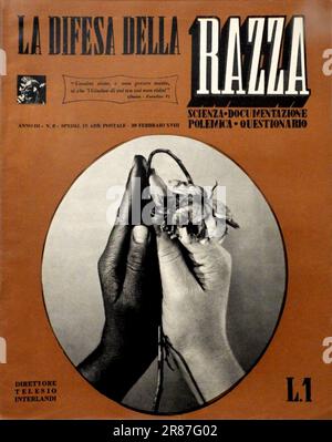 1940 , ITALIE : le journaliste italien et fasciste fanatique TELESIO INTERLANDI ( 1894 - 1965 ), directeur et fondateur du dangereux magazine raciste et antichémite LA DIFESA DELLA RAZZA ( LA DÉFENSE DE LA RACE ) de 1938 à 1943 , pubblié par Tumminelli e C., Roma . Sur la couverture une photo qui symbolise l'institution reproductive de la famille menacée par la race noire dégénérée (mariage mixte dont naît une fleur flétronnée). - RAZZISMO - RACISME - ANTISEMITISMO - ANTISEMISM - SHOAH - OLOCAUST - OLOCAUSTO - RAZZISTA - RACISTE - EBREWS - JUIF - EBREI - MATRIMONIO MISTO - NAZISTA Banque D'Images