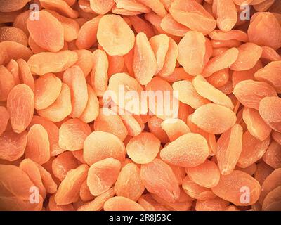 Abricots séchés. Tas d'abricots séchés comme arrière-plan Banque D'Images
