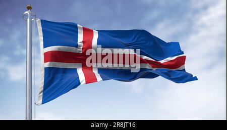 Vue rapprochée du drapeau national de l'Islande qui agite dans le vent. Drapeau bleu avec croix nordique rouge à bords blancs. 3d rendu d'illustration. fabri en volante Banque D'Images