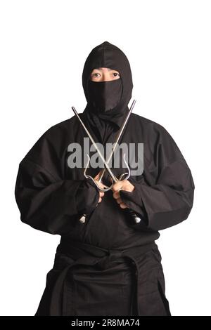 Homme asiatique portant Ninja Martial Arts uniforme isolé sur fond blanc Banque D'Images