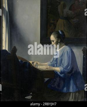 Femme lisant de la musique, 1935-1940. Peinture inspirée par la « femme en bleu lisant une lettre » de Vermeer. Henricus Antonius van Meegeren était un peintre et portraitiste néerlandais, considéré comme l'un des plus ingénieux forgers de l'art du 20th siècle. Il est devenu un héros national après la Seconde Guerre mondiale quand il a été révélé qu'il avait vendu une peinture forgée à Reichsmarschall Hermann G&#xf6;ring pendant l'occupation nazie des pays-Bas. Banque D'Images