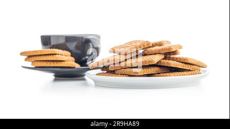 Biscuits au caramel sucré. Délicieux biscuits sur plaque isolée sur fond blanc. Banque D'Images