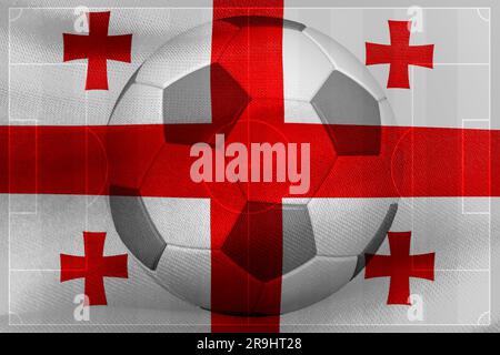 Le drapeau de la Géorgie avec un ballon de football. Banque D'Images
