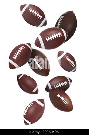 Balles de football américain en cuir tombant sur fond blanc Banque D'Images