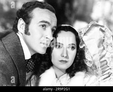 DAVID NIVEN comme Edgar Linton et MERLE OBERON comme Cathy Linton dans WUTHERING HAUTEURS 1939 réalisateur WILLIAM WYLER roman Emily Bronte scénario Ben Hecht et Charles MacArthur musique Alfred Newman The Samuel Goldwyn Company / United Artists Banque D'Images