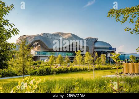 Milano Convention Center called 'Allianz MiCo', a conference centre with an aluminum coating, surrounded by a park, in CityLife district, Milano Italy Stock Photo