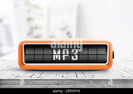 Message mp3 sur un périphérique analogique dans une salle lumineuse sur une table en bois Banque D'Images