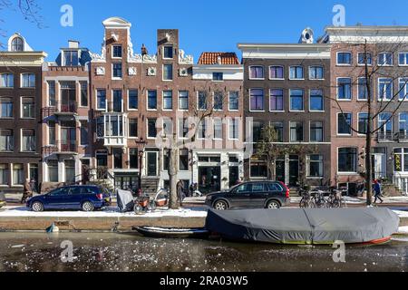 Canaux gelés dans le centre-ville d'Amsterdam, pays-Bas Banque D'Images