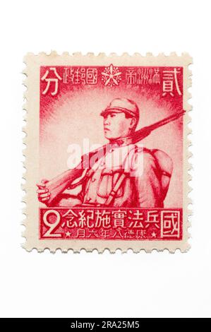 Timbre national de droit de la conscription de Manchukuo Banque D'Images