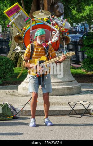 Un musicien qui se produit dans le jardin public de Boston, ma Banque D'Images