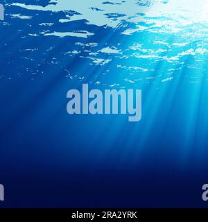 Belle surface bleue de l'océan vue sous l'eau avec des rayons de lumière du soleil qui brille à travers. Résumé vagues fractales sous l'eau Banque D'Images