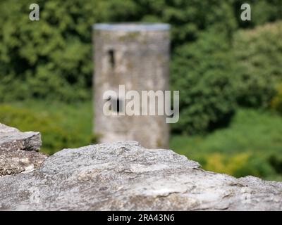 Ancienne pierre sur le fond de la tour antique, château de Blarney en Irlande, ancienne forteresse celtique Banque D'Images