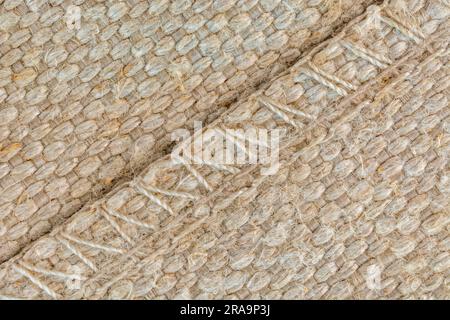 Gros plan de grosses coutures sur la toile de l'ancien siège. Pour le point dans l'idiome du temps, bien fixé, fixe. Banque D'Images