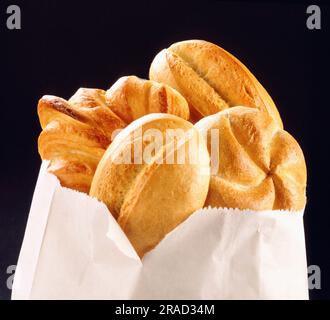 Petits pains frais dans un sac de papier Banque D'Images