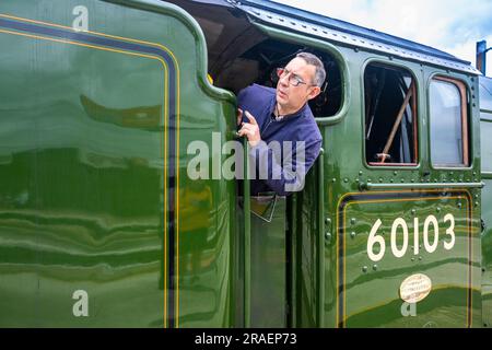 Portrait du chauffeur de moteur du train à vapeur Flying Scotsman à la gare de Grantham lorsqu'il voyage de London Kings Cross à Édimbourg dans le cadre de sa célébration du centenaire Banque D'Images