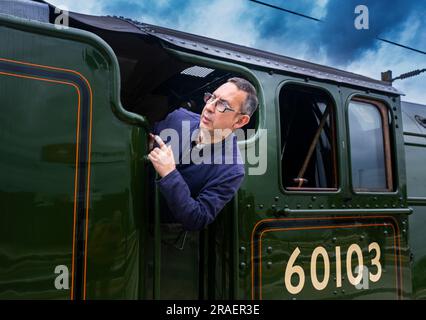 Portrait du chauffeur de moteur du train à vapeur Flying Scotsman à la gare de Grantham lorsqu'il voyage de London Kings Cross à Édimbourg dans le cadre de sa célébration du centenaire Banque D'Images