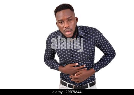 portrait d'un beau jeune homme d'affaires souffrant d'un mal d'estomac. Banque D'Images